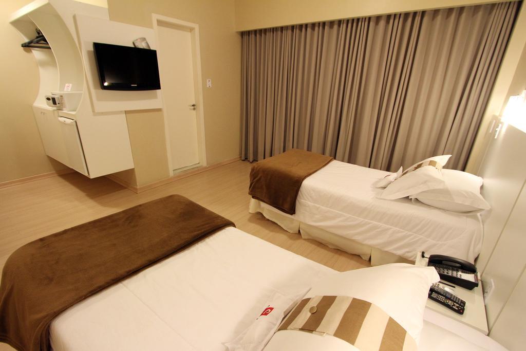Hotel Curi Executive Pelotas Rum bild