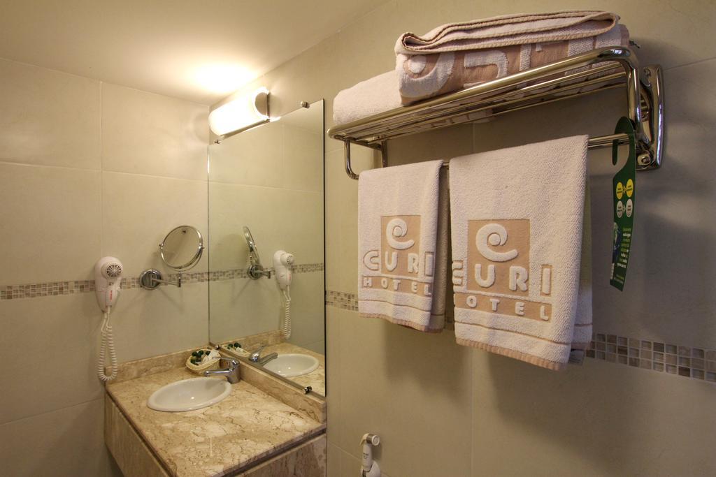 Hotel Curi Executive Pelotas Rum bild