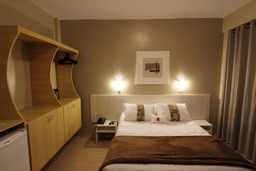 Hotel Curi Executive Pelotas Rum bild