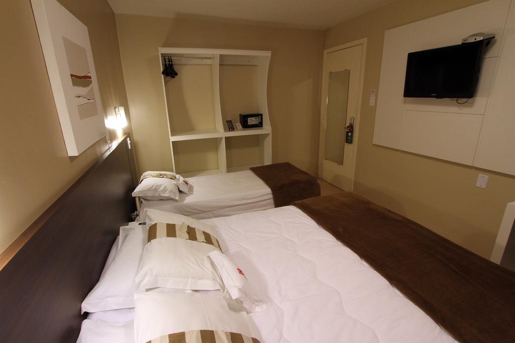 Hotel Curi Executive Pelotas Rum bild