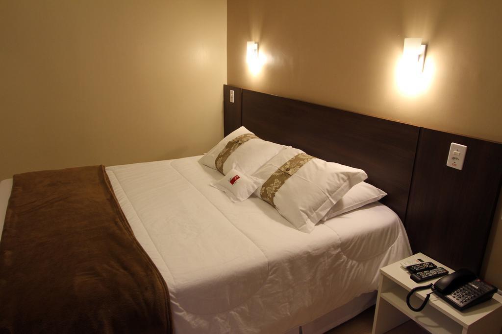 Hotel Curi Executive Pelotas Rum bild