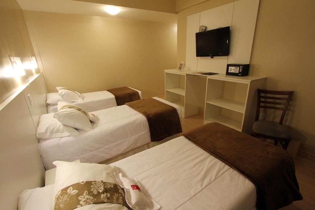 Hotel Curi Executive Pelotas Rum bild