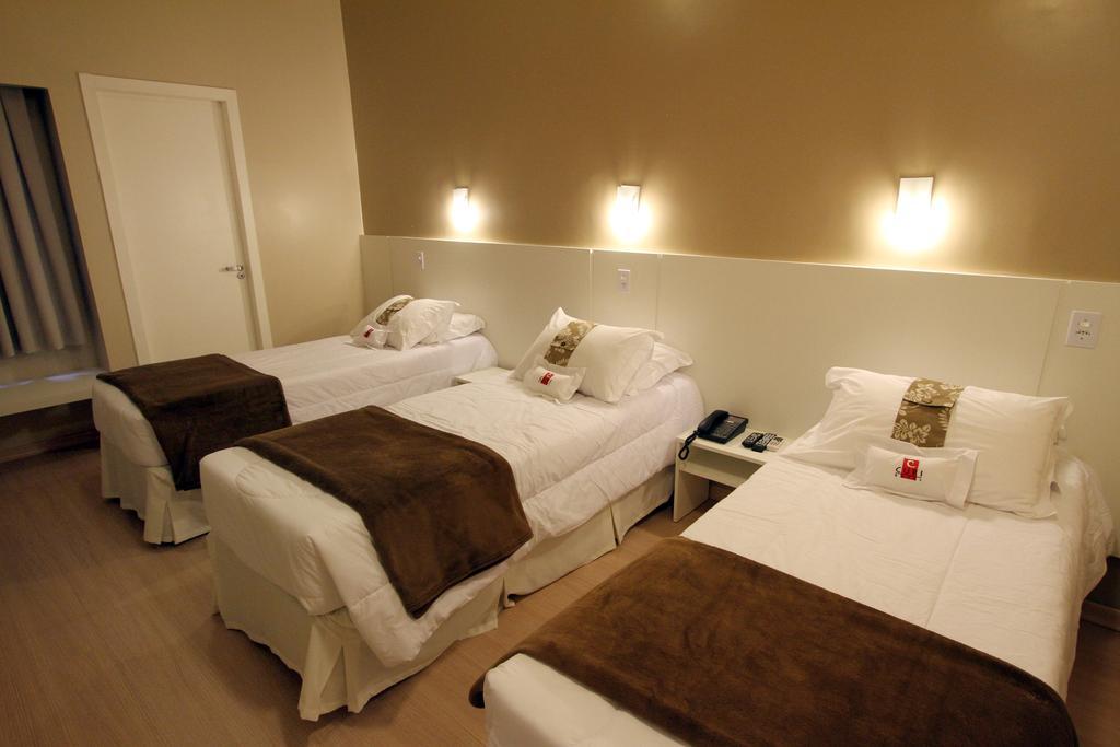 Hotel Curi Executive Pelotas Rum bild