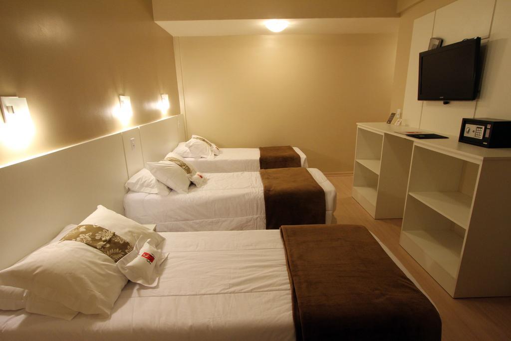 Hotel Curi Executive Pelotas Rum bild