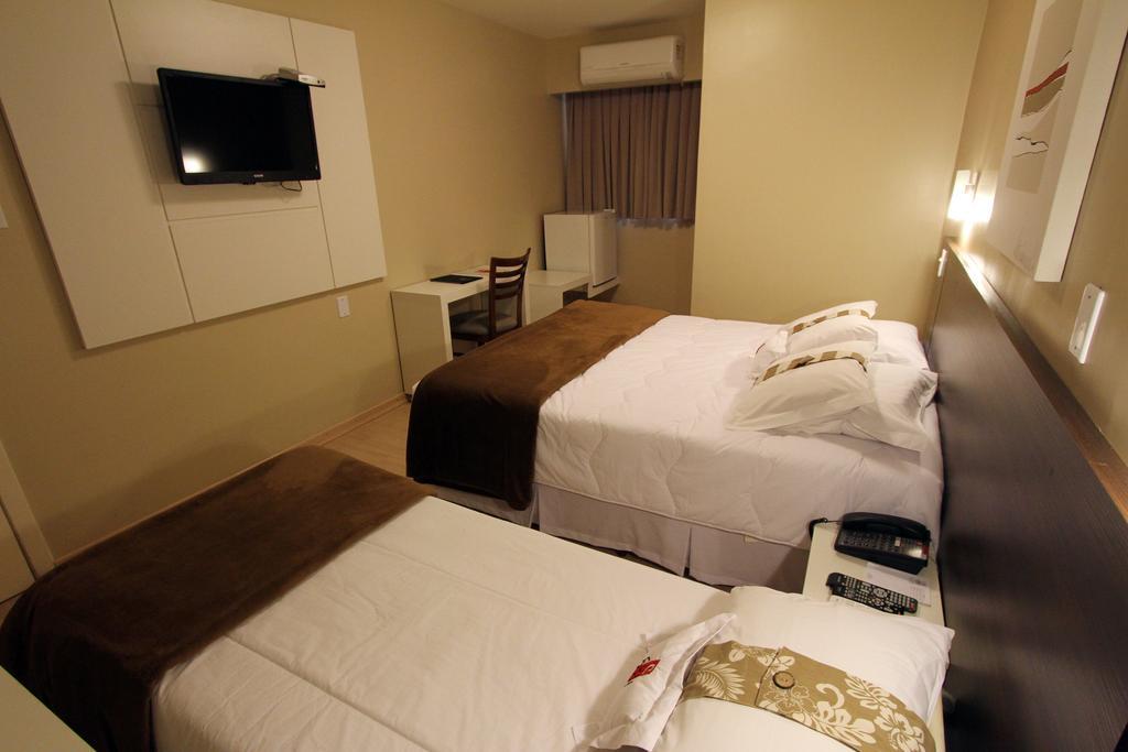 Hotel Curi Executive Pelotas Rum bild