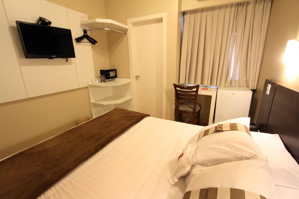 Hotel Curi Executive Pelotas Rum bild