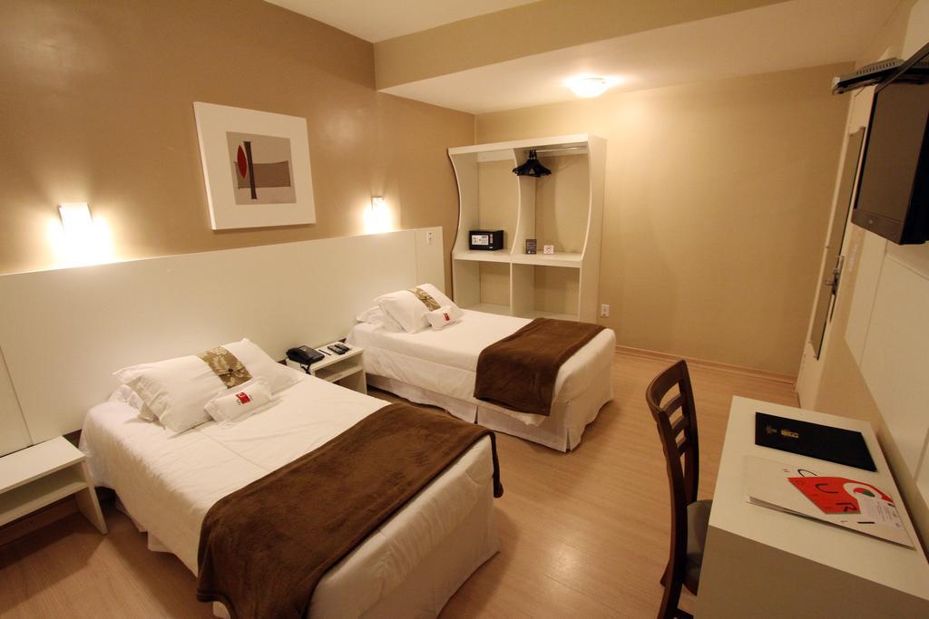 Hotel Curi Executive Pelotas Rum bild