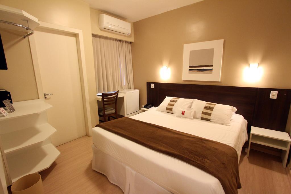 Hotel Curi Executive Pelotas Rum bild